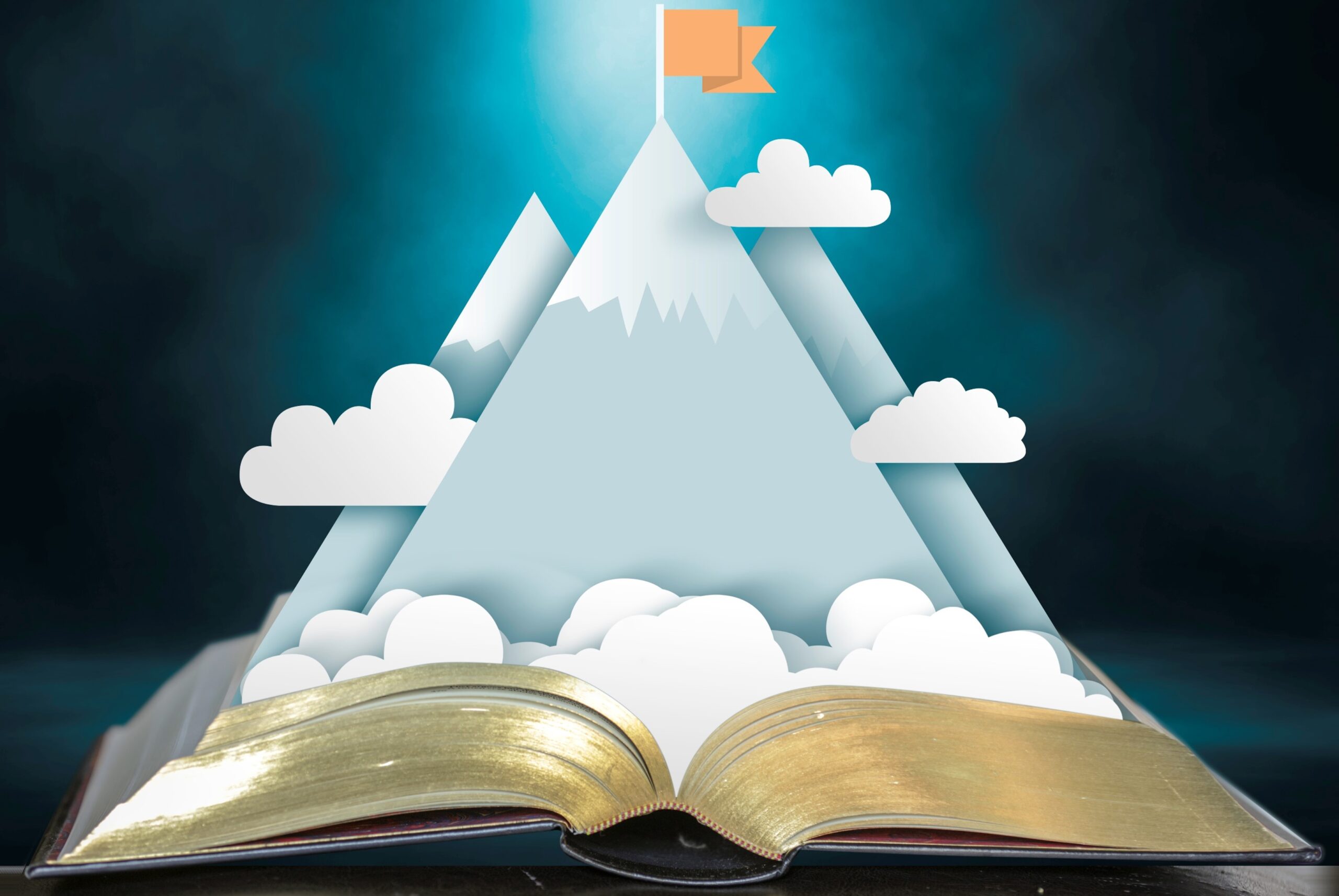 En öppen bok med bergstoppar.