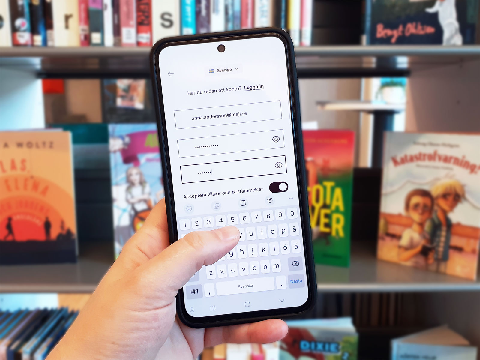 Mobiltelefon som visar sida där man byter inloggningsmetod i Biblio.